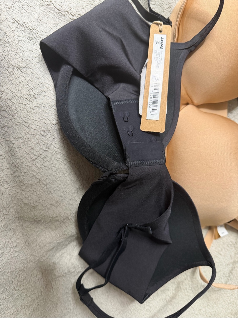 SKIMS Smooth T-Shirt Bra Pack in Nude, Tan, and Black - Picture 3 of 8